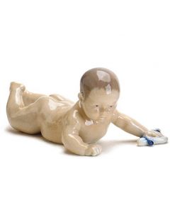 Bimbo piccolo sdraiato Statuina
